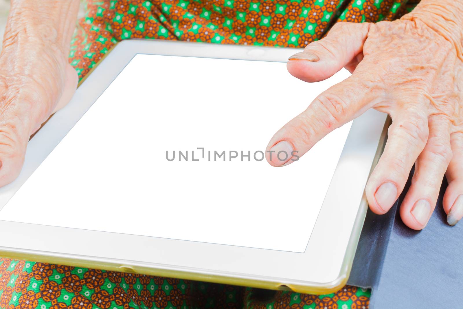 horizontal photo of closeup asian elder woman using tablet, technology concept.