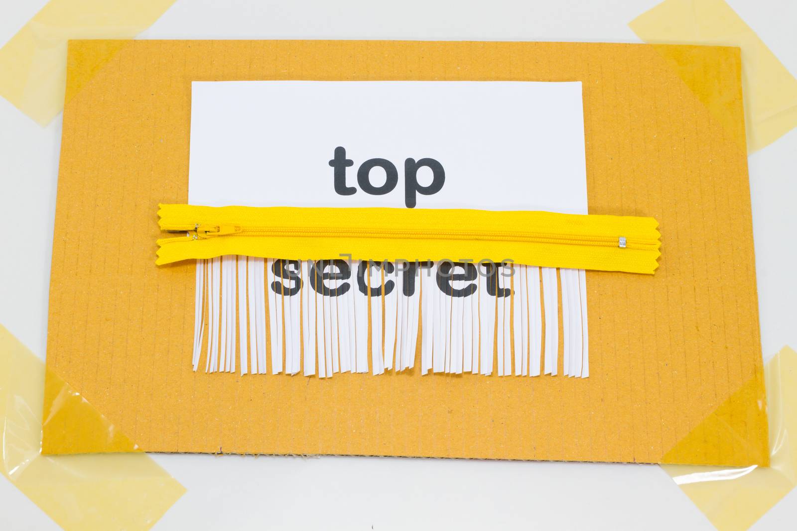 Top Secret, destroying sheet of paper with yellow zipper as a shredder.