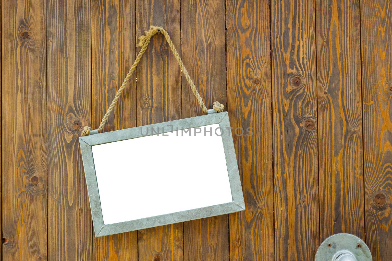 white blank space board with rope on wooden door of a coffee shop, clipping path