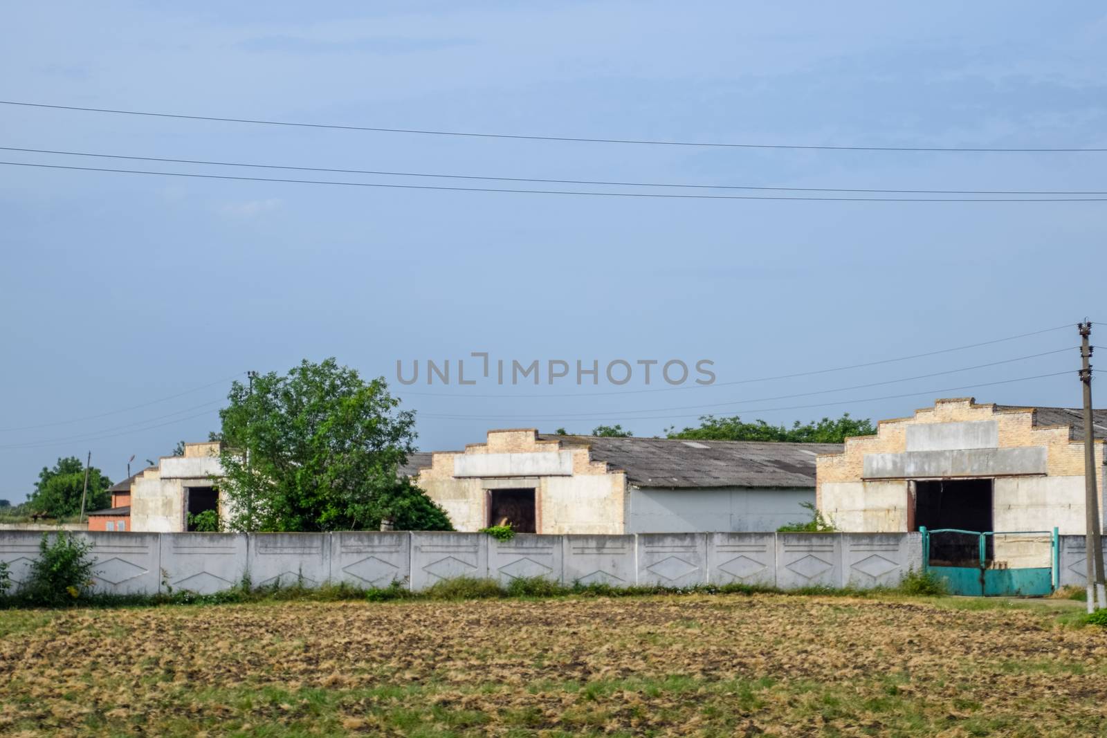 Old Soviet hangars for storing machinery and agricultural raw materials
