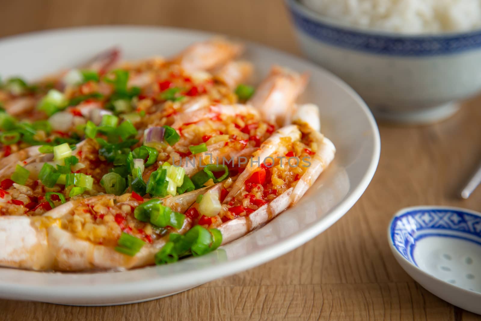 steam prawn with garlic and chilli on wooden background