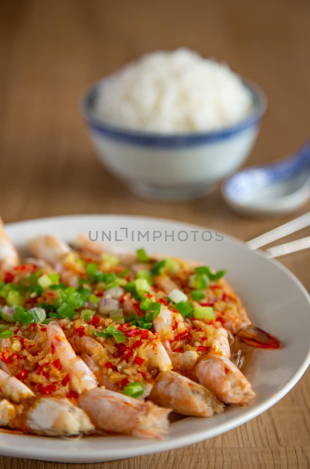 steam prawn with garlic and chilli on wooden background