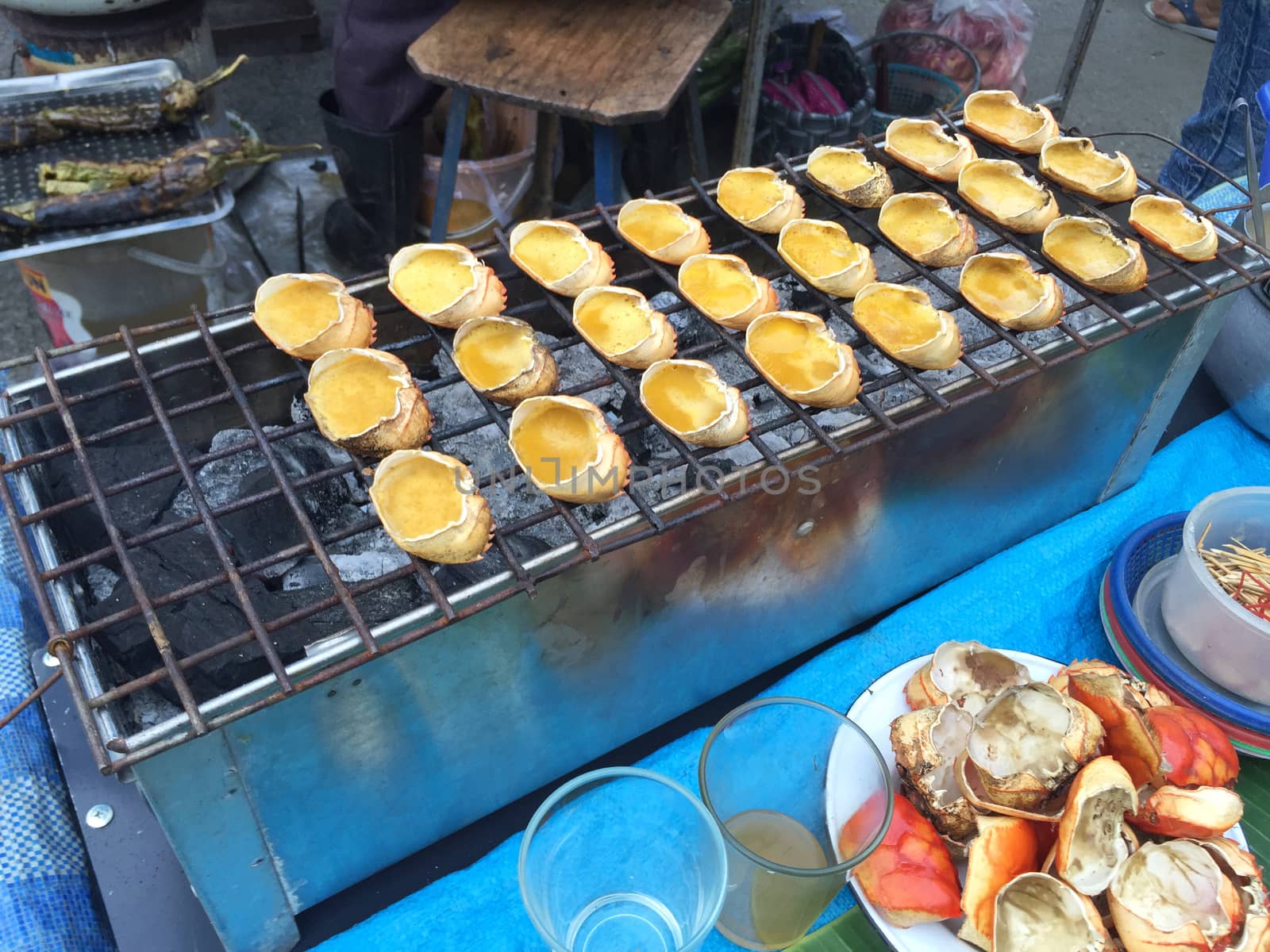 horizontal photo of "Ong Pu" Northern Thai traditional food cooked in in crab shell