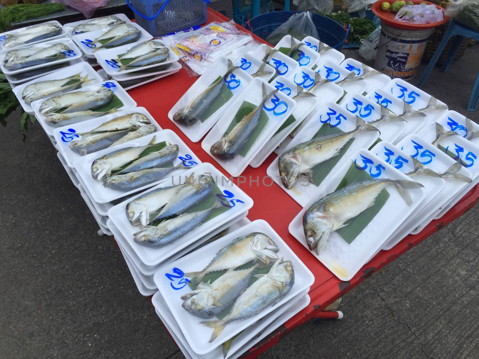 CHIANG RAI, THAILAND - OCTOBER 11 : Steamed thai mackerel fish (pla tu) for sale in plastic wrapped in Thai market on October 11, 2016 in Chiang rai, Thailand. 