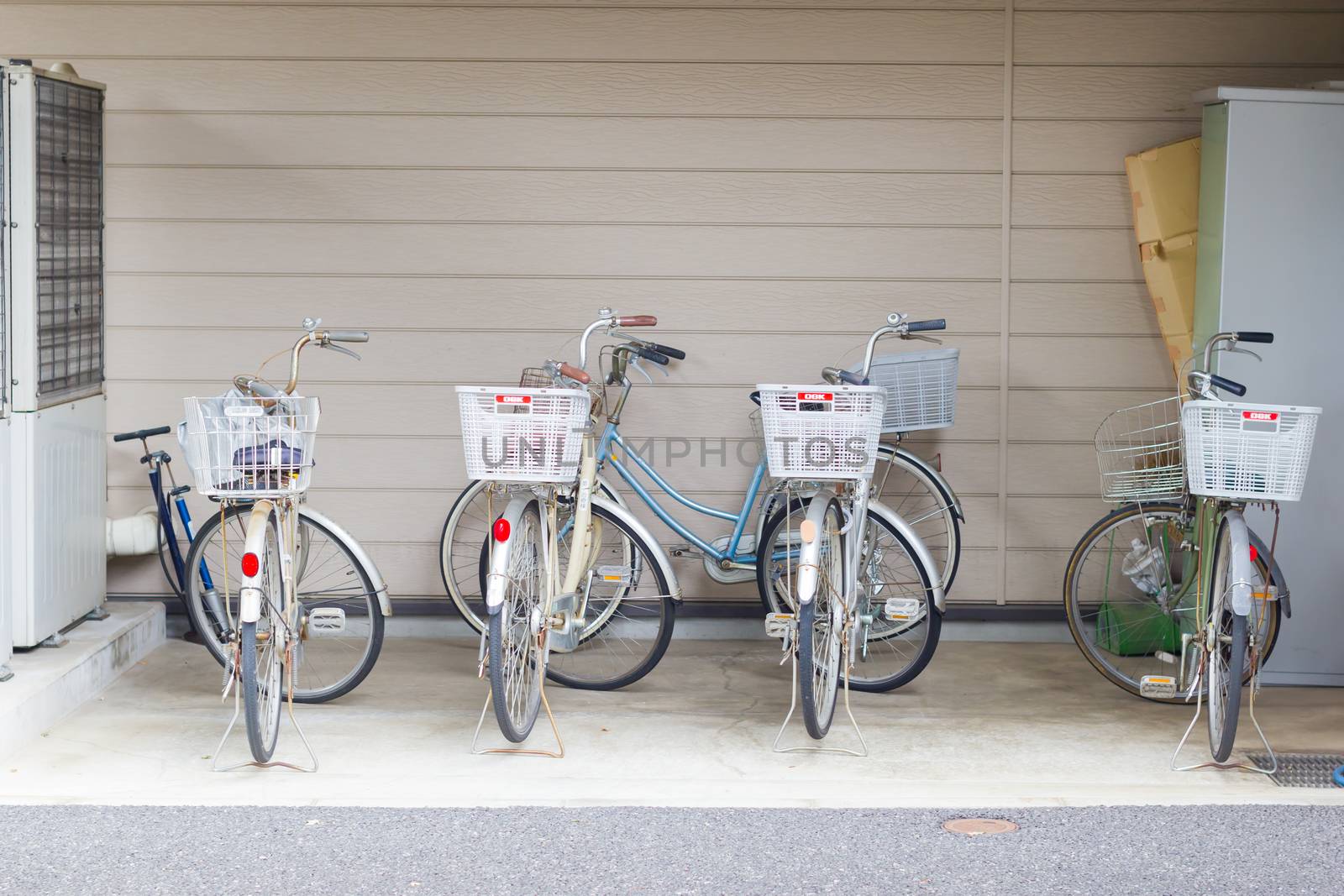 OSAKA, JAPAN - SEPTEMBER 16 : bicycles parking in the garage of a house in countryside on September 16, 2017 in Osaka, Japan.