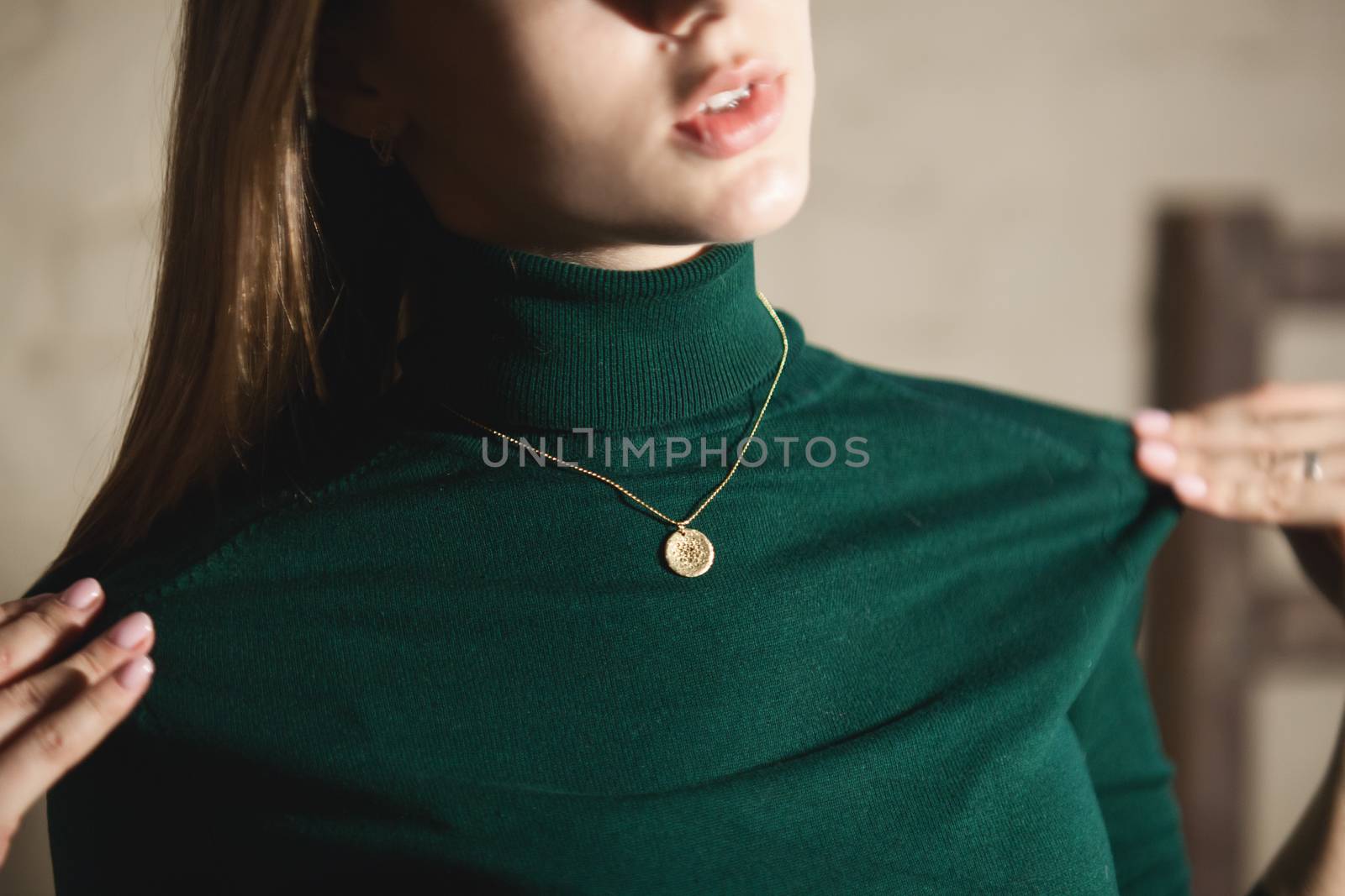 Portrait of beautiful fair young woman with fashion jewelry, one light source