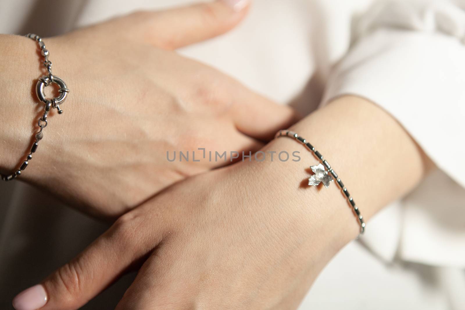 Portrait of beautiful fair young woman with fashion jewelry, one light source