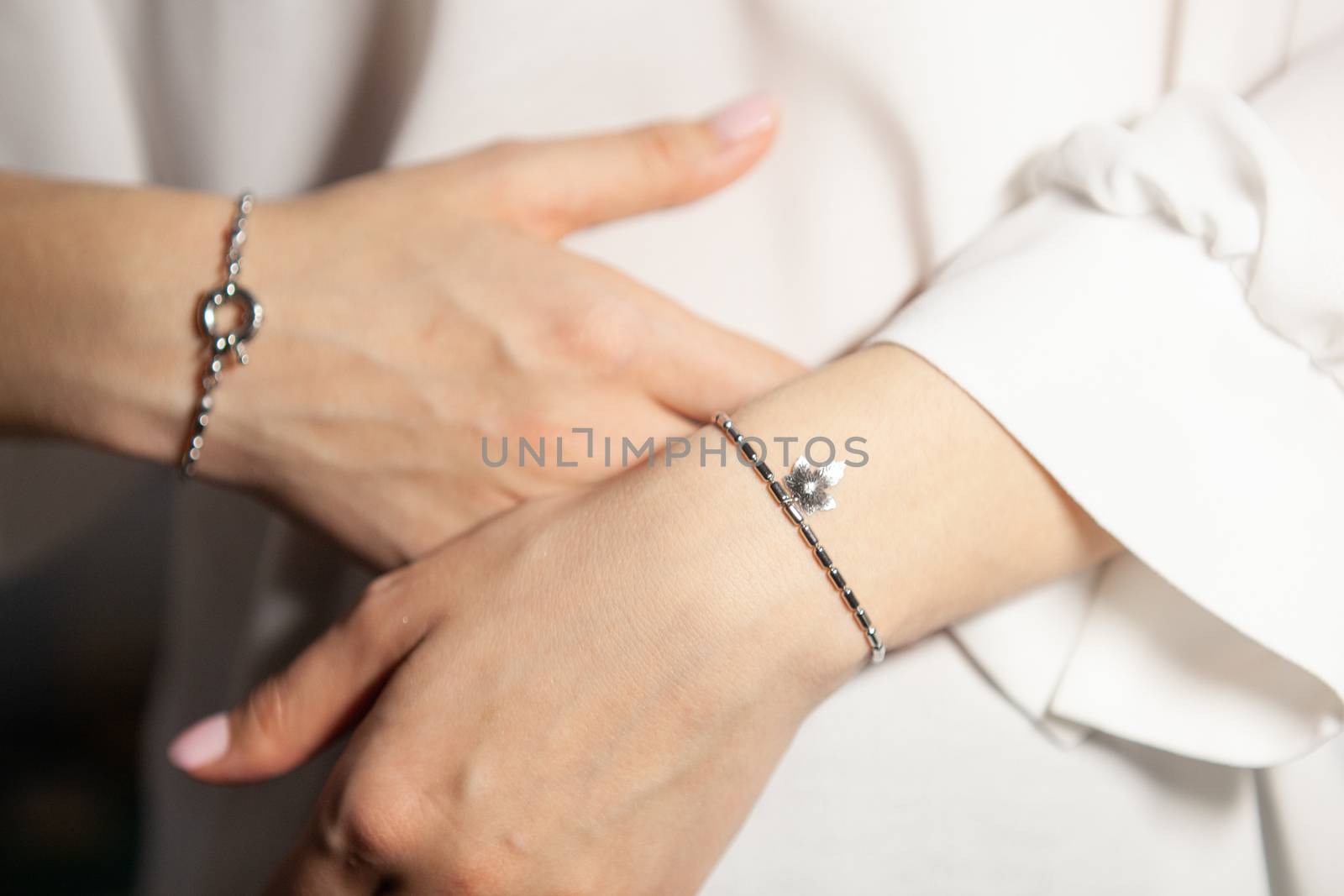 Portrait of beautiful fair young woman with fashion jewelry, one light source