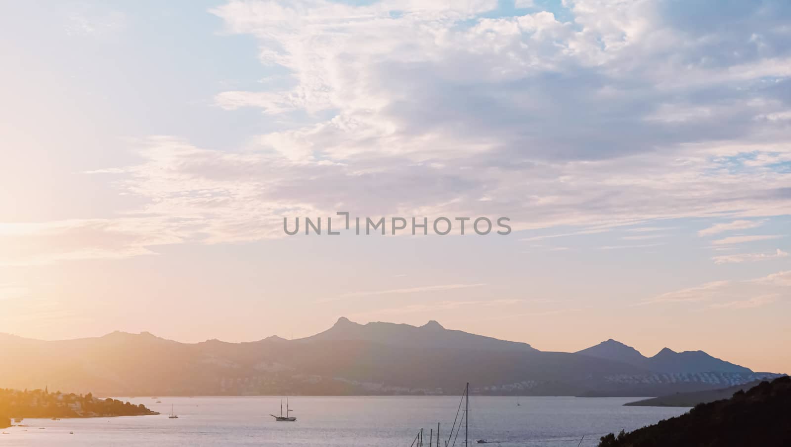 Beautiful sea view and mountains in the Mediterranean at sunset, summer vacation travel and holiday destination