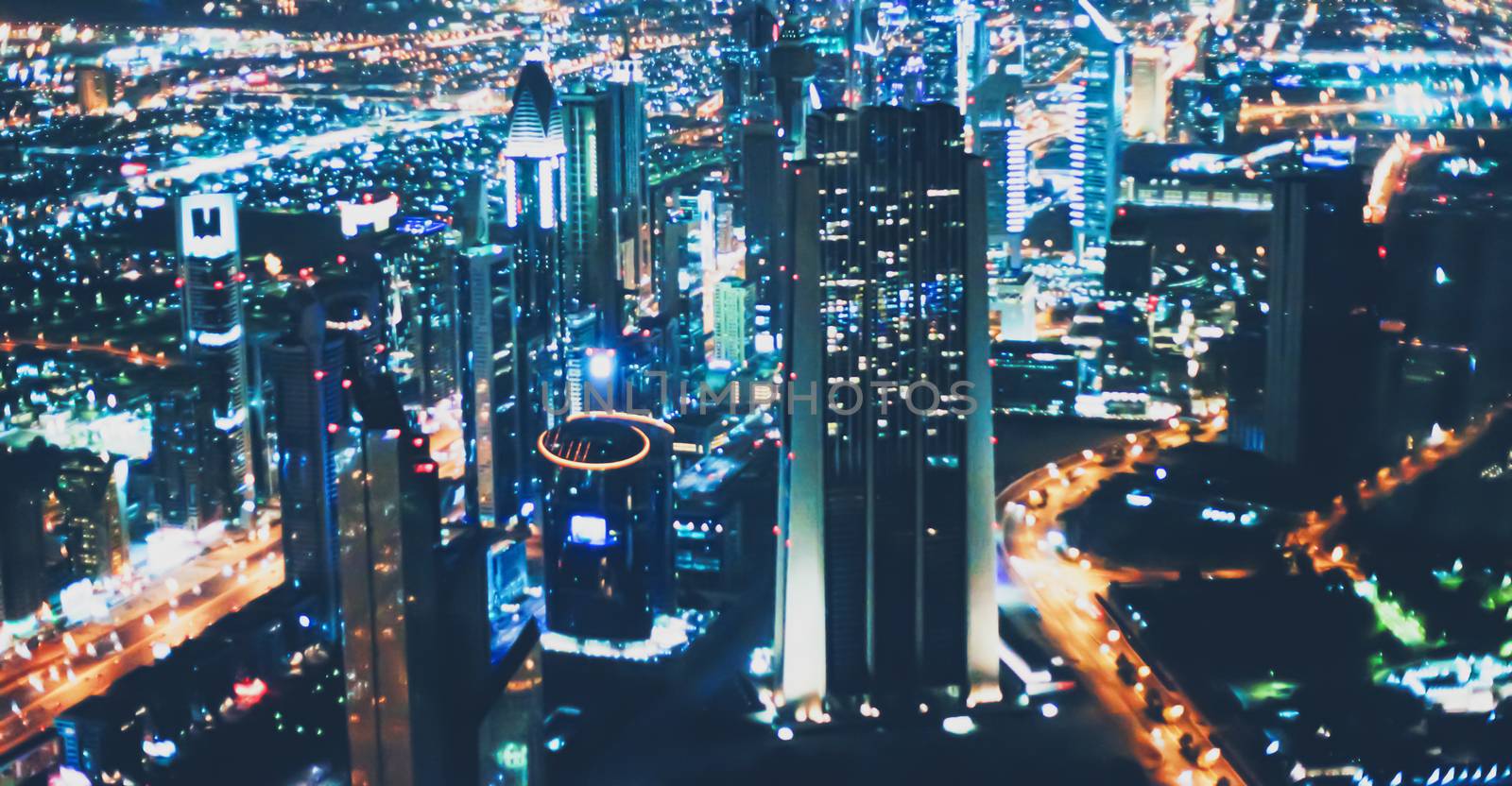 Aerial night view of Dubai in United Arab Emirates, metropolitan cityscape scenery