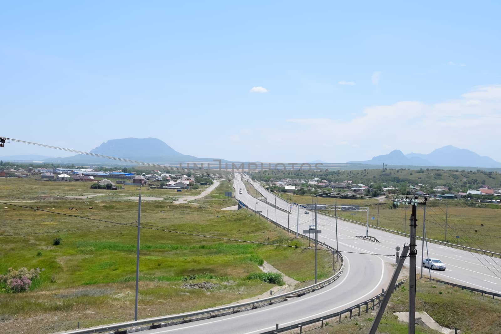 The road crossing is adjacent to the secondary road.