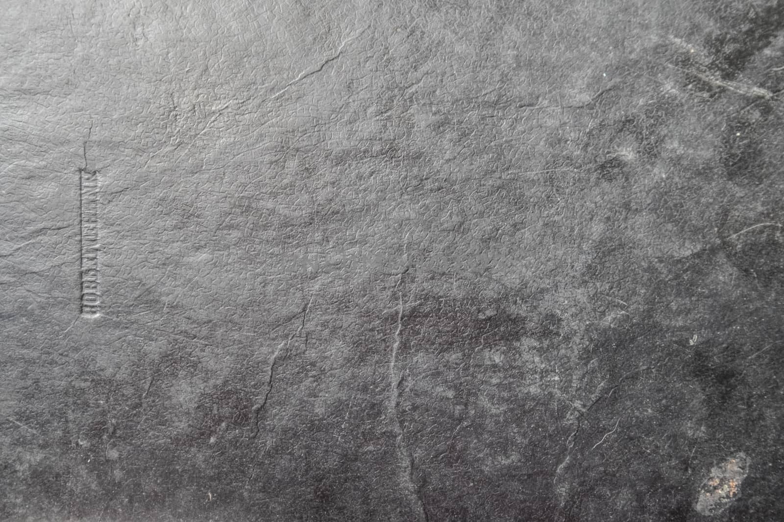 Background surface texture of an old book cover.