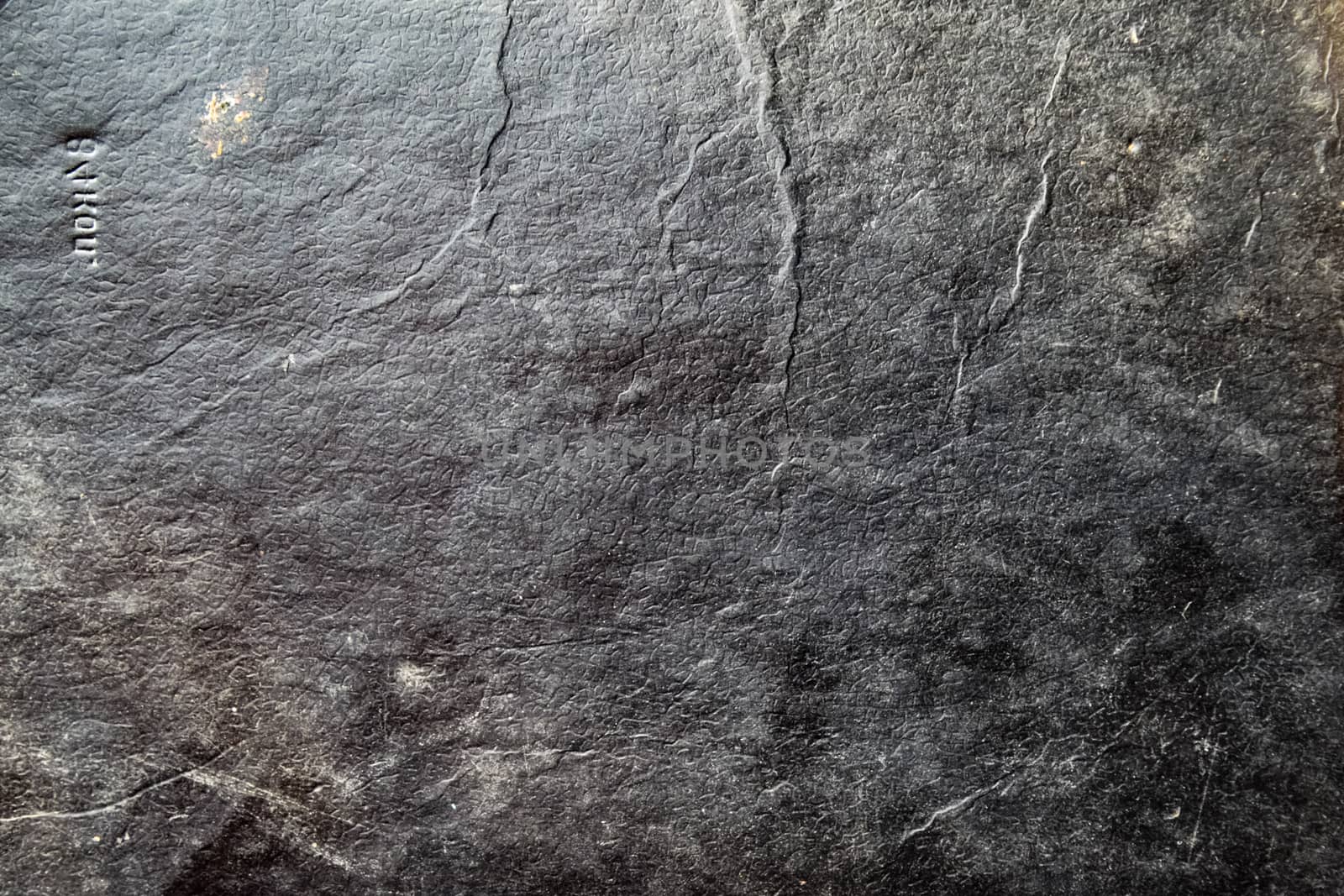 Background surface texture of an old book cover.
