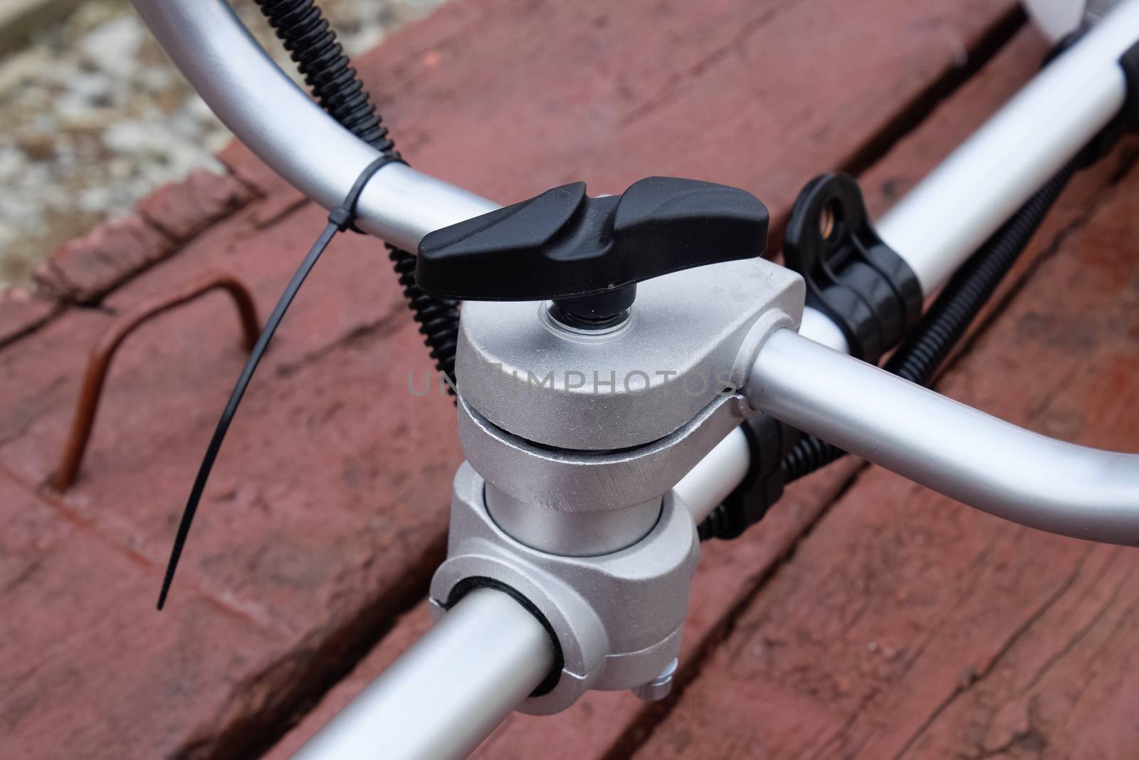 Fasteners for gas trimmer construction. Bolts and screws on the trimer body. Trimer gascosis with a leaf for mowing grass and shrubs.