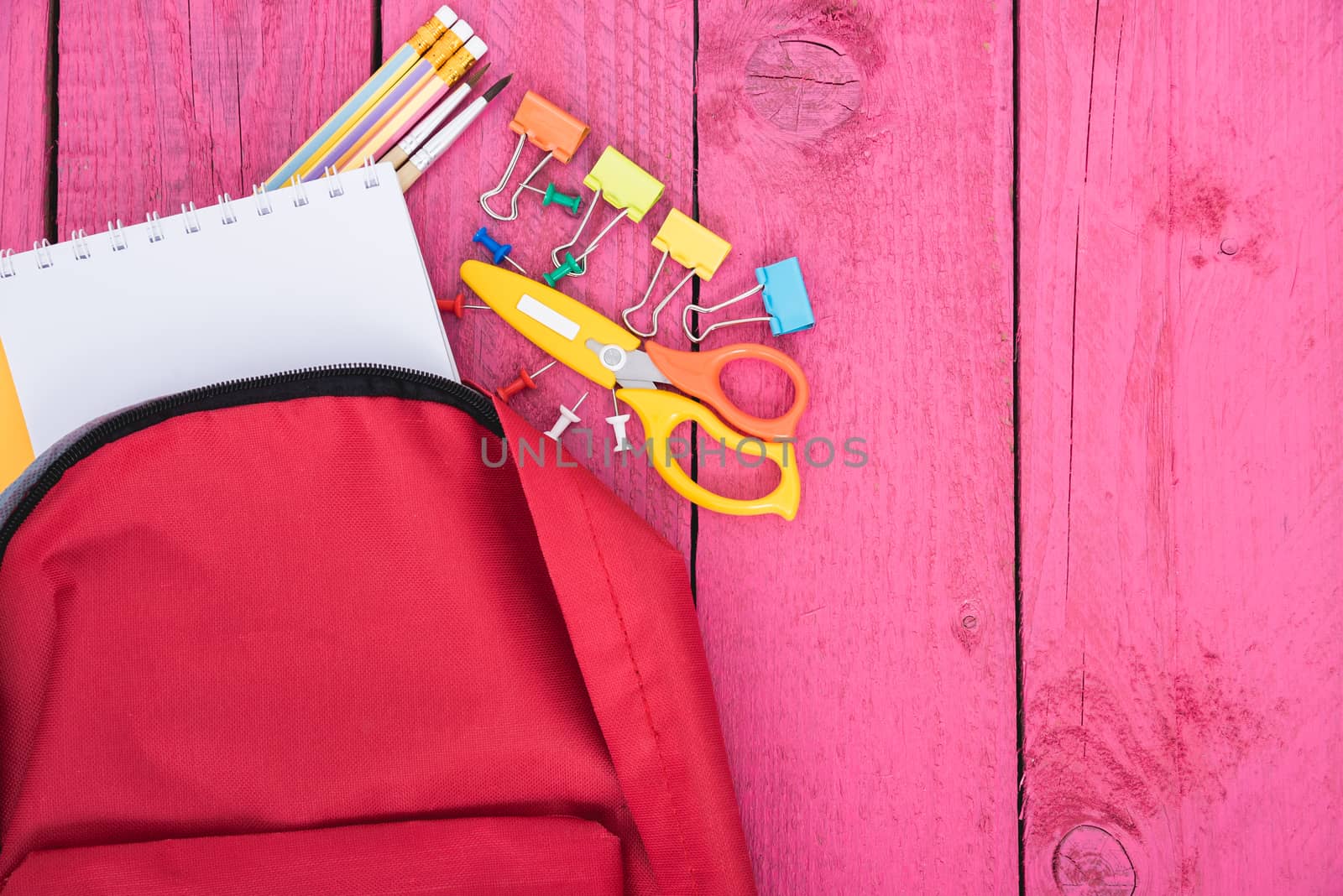 Top view Red bag backpack for education children by Sorapop