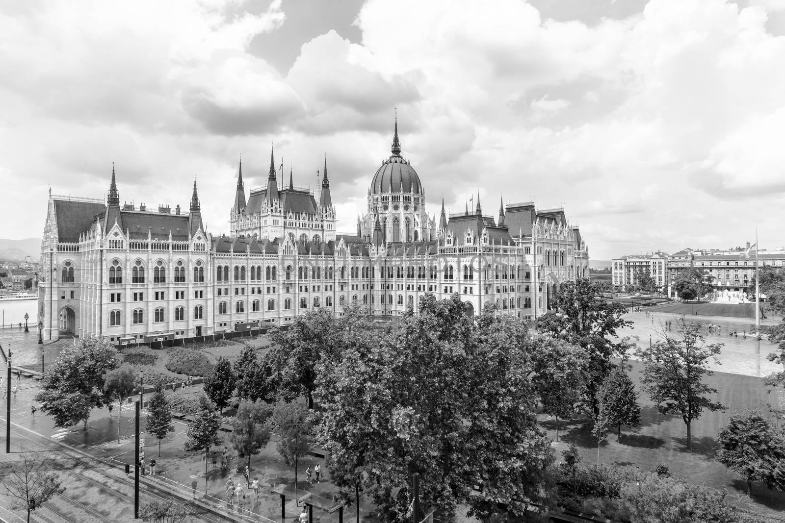 Hungarian parliament building from behind on a sunny day in summer season in Budapest, Hungary - aerial view.