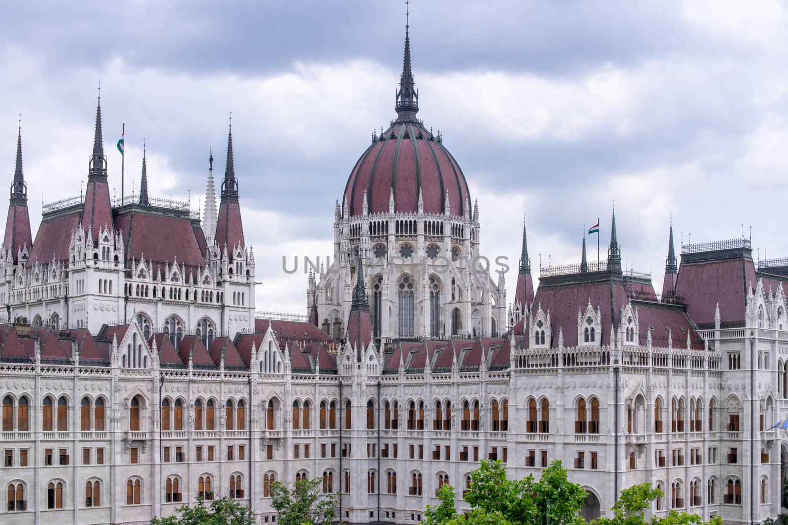 Hungarian parliament building from behind on a sunny day in summer season in Budapest, Hungary - aerial view. by tamas_gabor