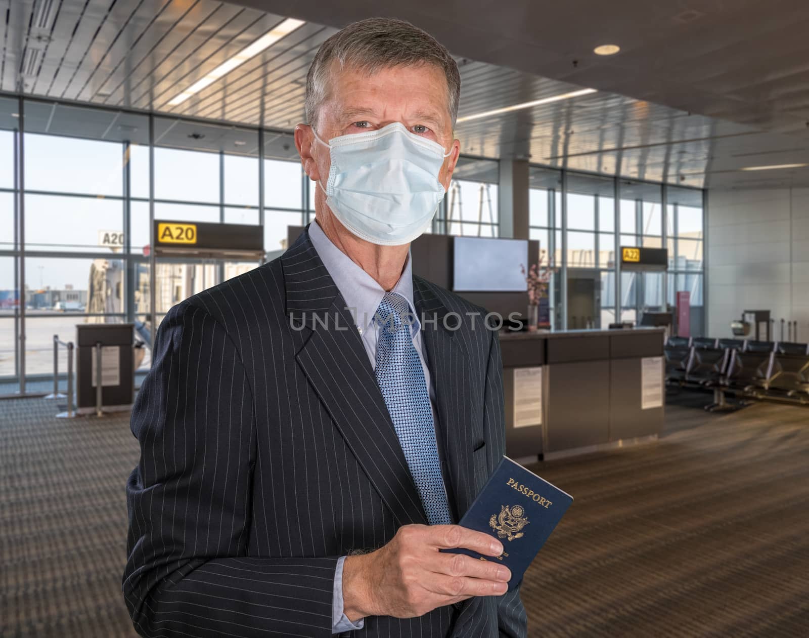 Mockup of airport terminal with casual senior adult holding passport and wearing mask against coronavirus