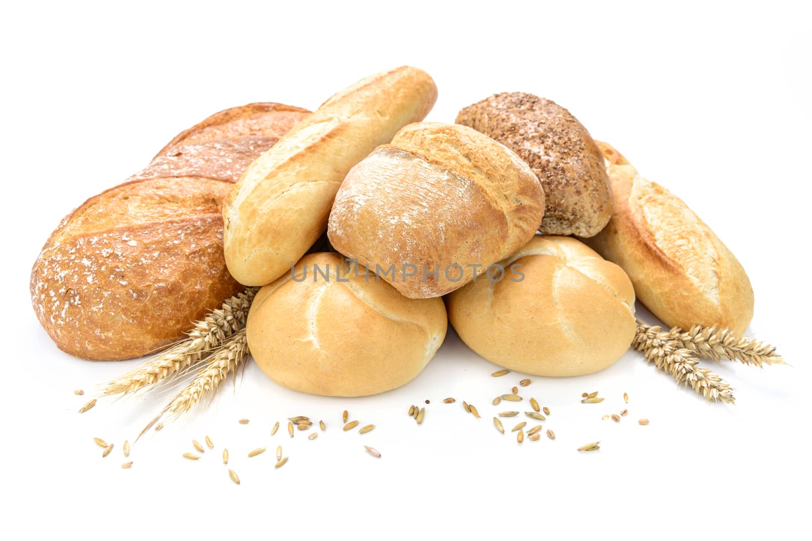 Group of fresh breads and wheat isolated on a white background.