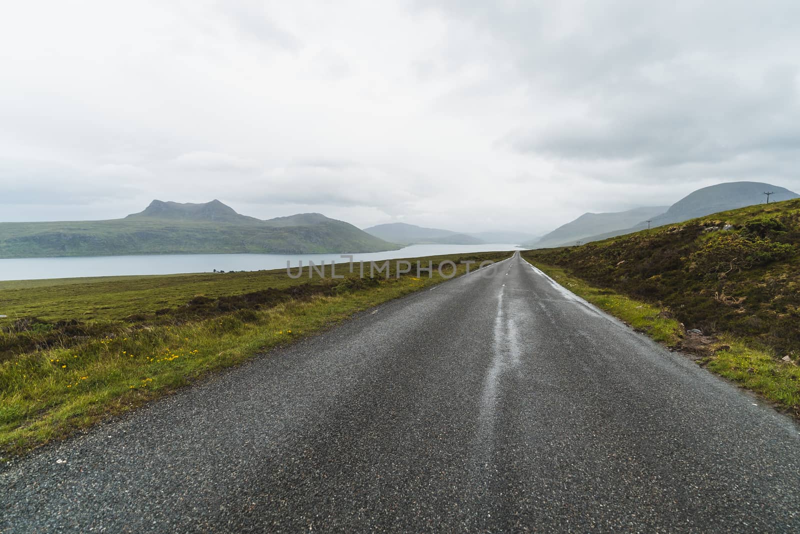 Landscape of mountains and a road in Scotland