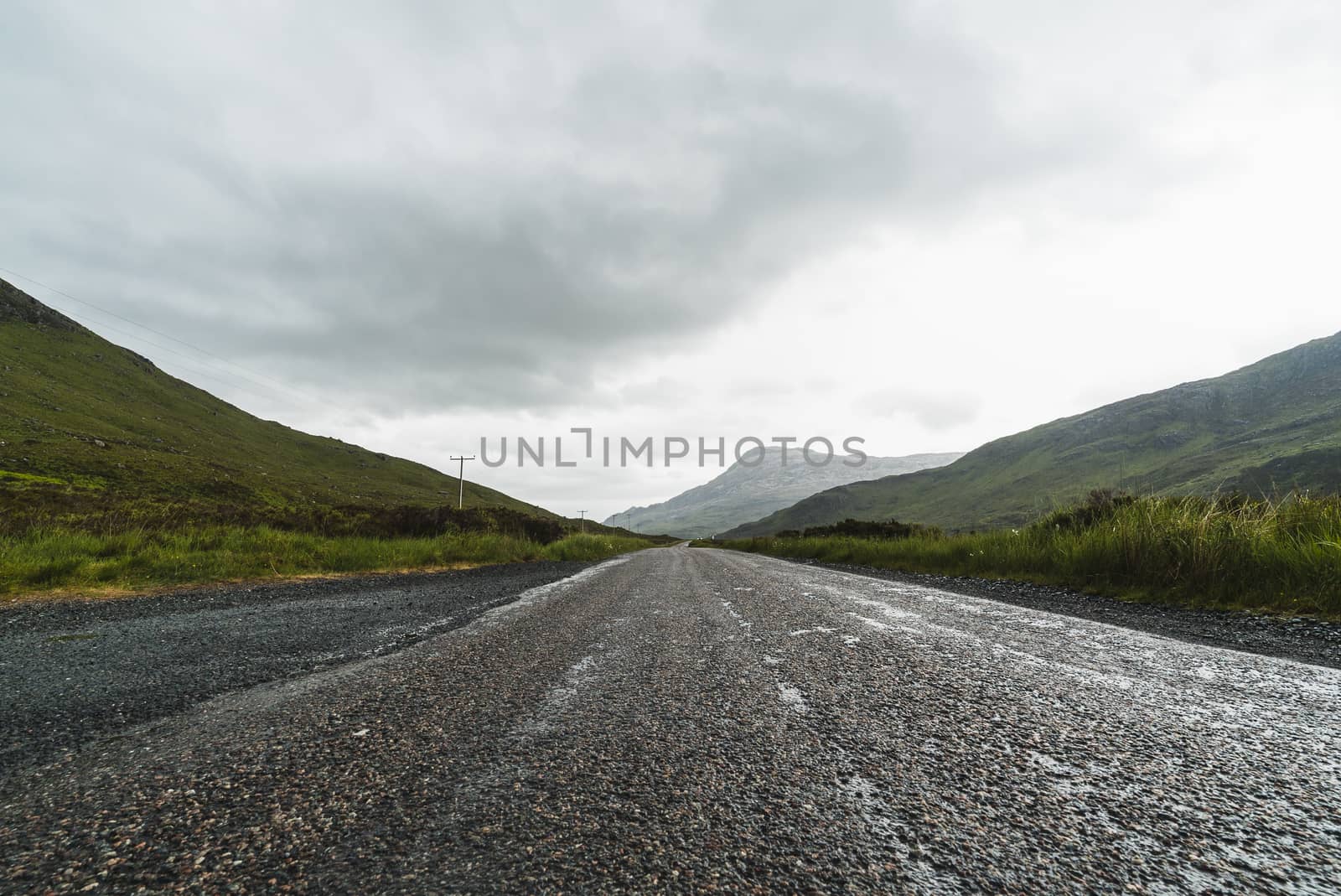 Landscape of mountains and a road in Scotland