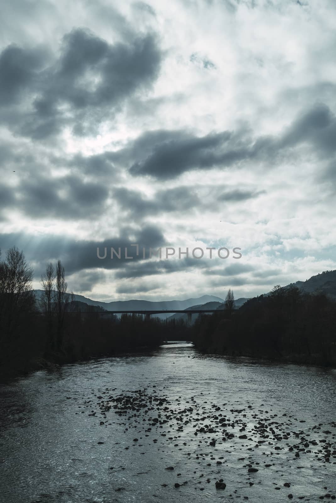 River in cloudy day by sergio_amate
