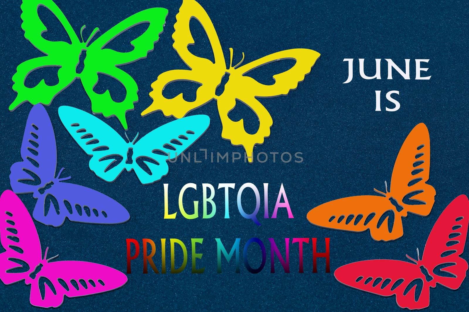 June is LGBTQIA pride month. Greeting text and rainbow-colored butterflies on a blue background.