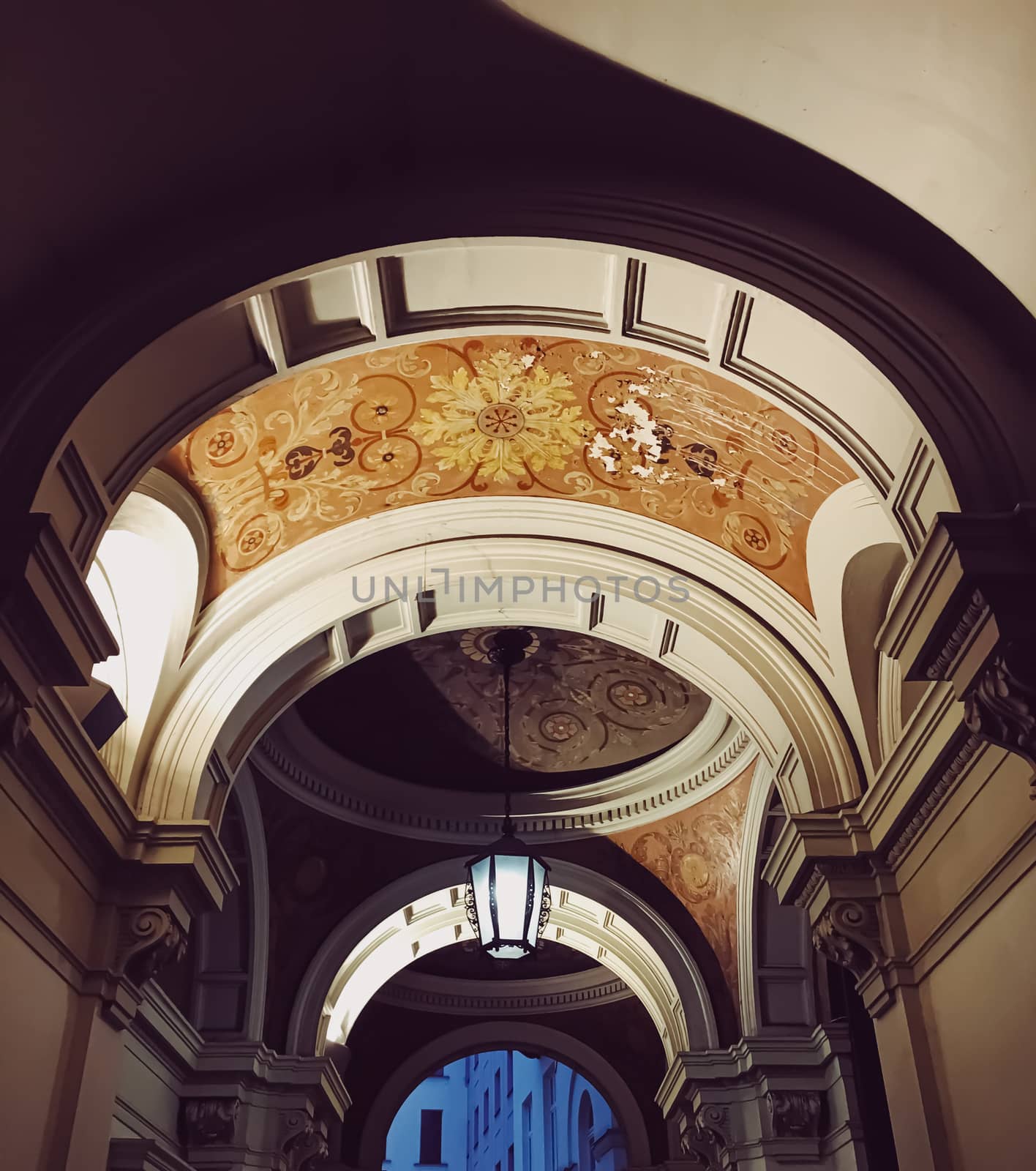 Exterior facade of classic building in the European city at night, architecture and design detail