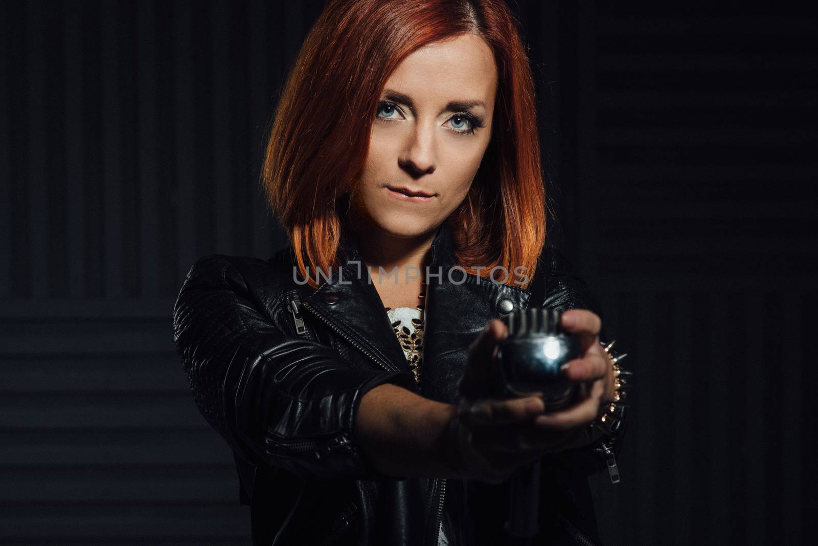 young red-haired girl in a white dress and a black leather rocke by Andreua