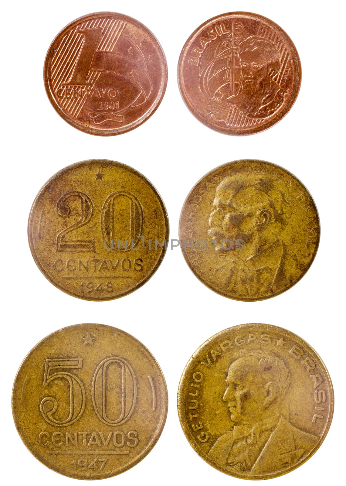 three different old brazilian coins isolated on white background