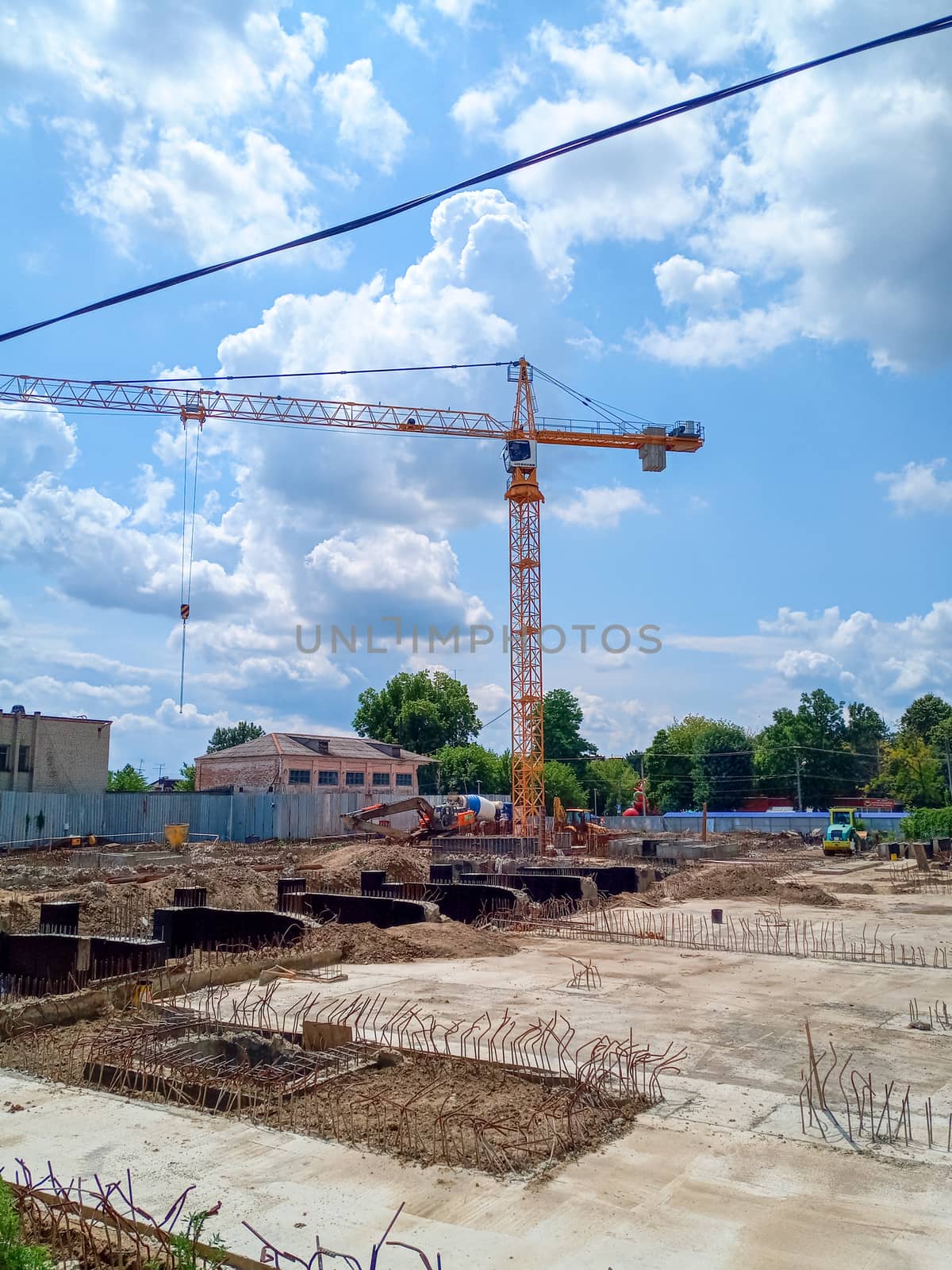 Construction of a new building, the Big Tower Crane on the construction site.