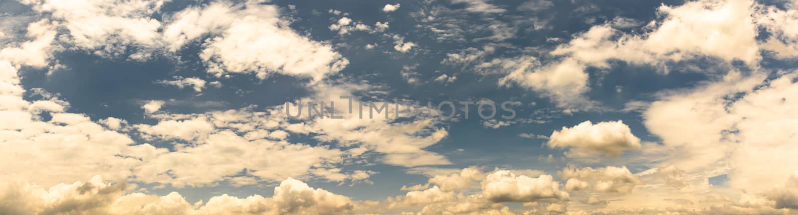 Panoramic white fluffy clouds in the blue sky, Fantastic soft white clouds against blue sky