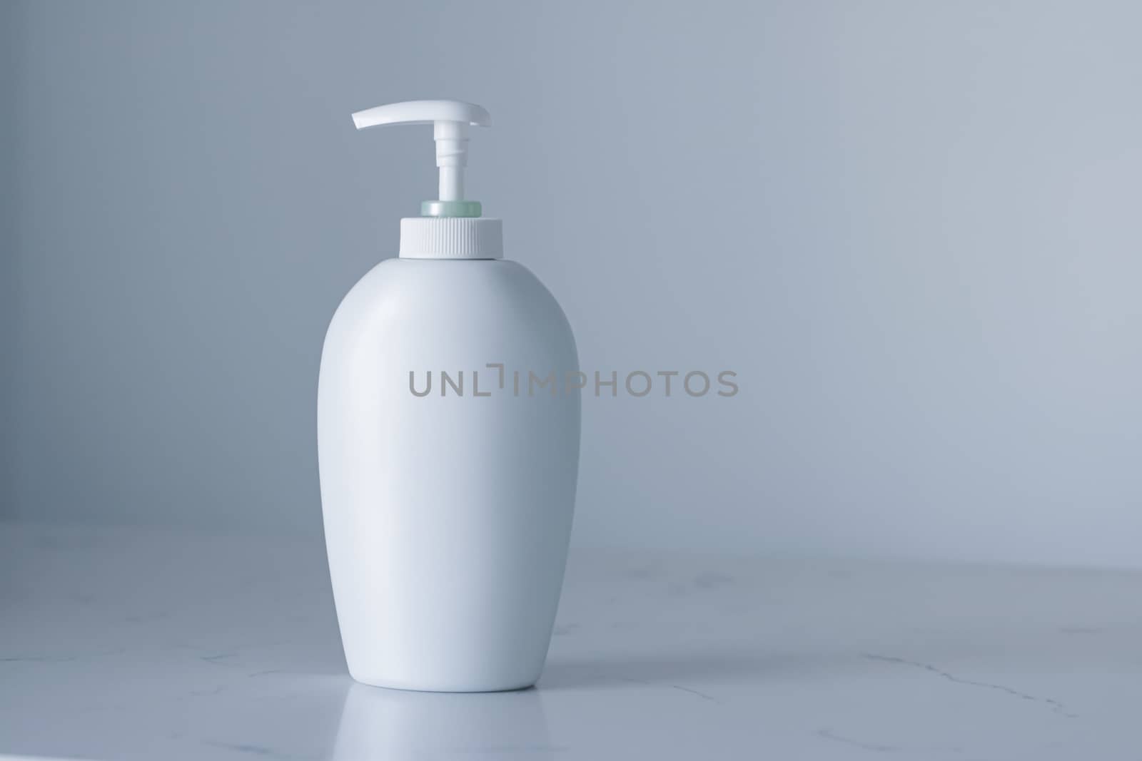 Blank label cosmetic container bottle as product mockup on gray background, hygiene and healthcare