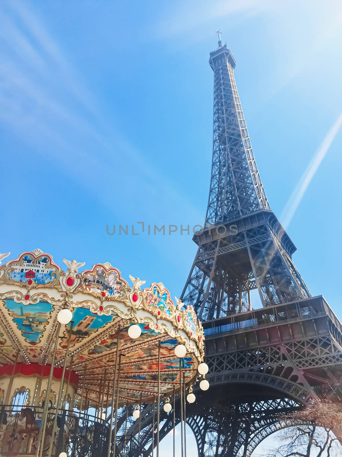 Eiffel Tower and blue sky, famous landmark in Paris, France by Anneleven