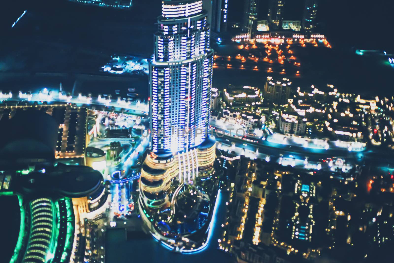 Aerial night view of Dubai in United Arab Emirates, metropolitan cityscape scenery