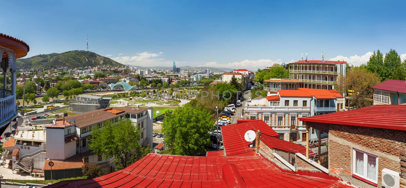 Panorama view of Tbilisi. Famous modern landmarks - Rike park and Bridge of Peace. Georgia country.