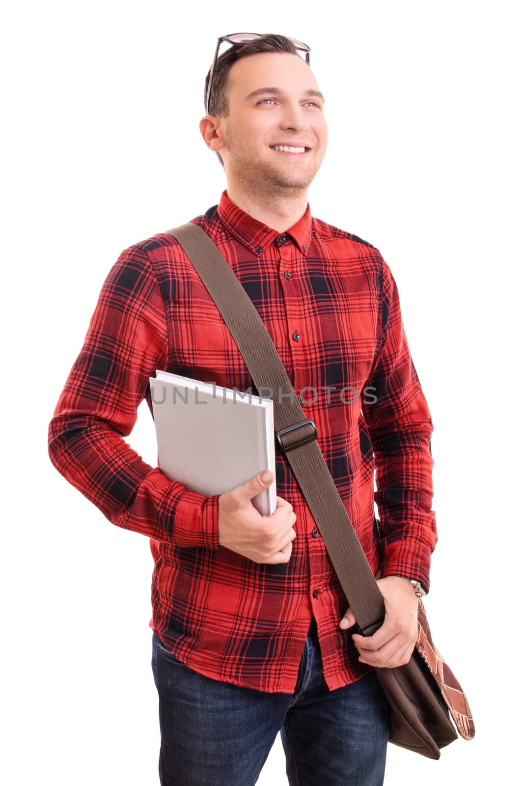 Smiling man with shoulder bag holding a notebook by Mendelex