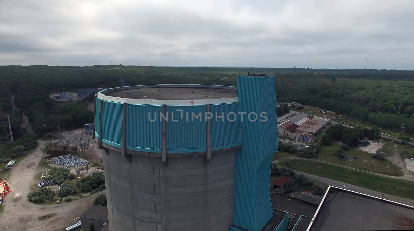 Aerial View of an Abandoned Nuclear Power Plant as Seen by a Drone on a Summer Day