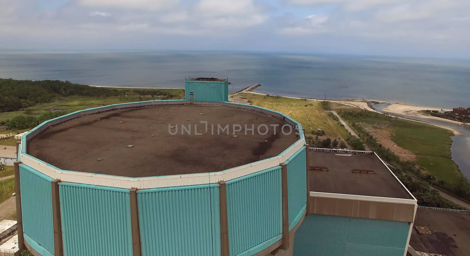 Aerial View of an Abandoned Nuclear Power Plant as Seen by a Drone on a Summer Day