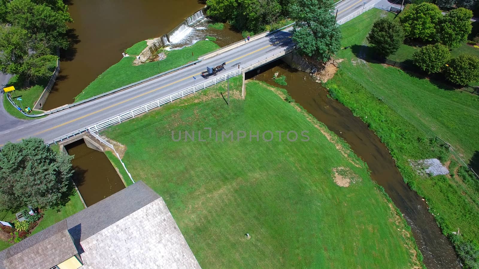 Aerial View of Amish Farm Countryside in Autumn from a Drone