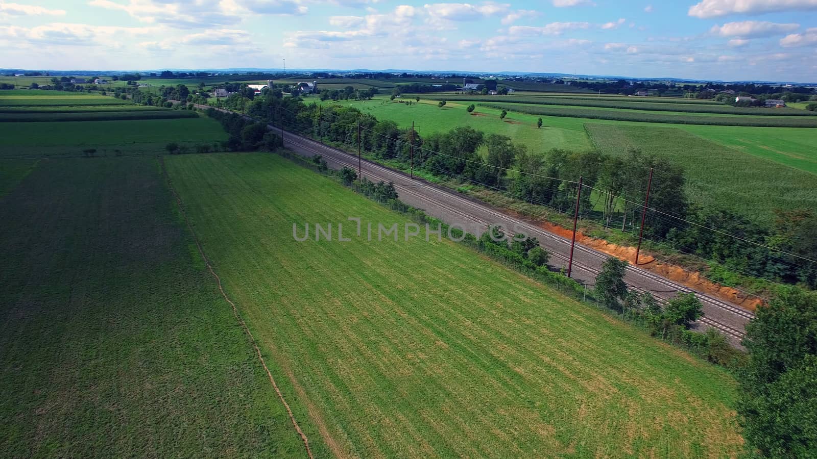 Aerial View of Amish Farm Countryside in Autumn from a Drone