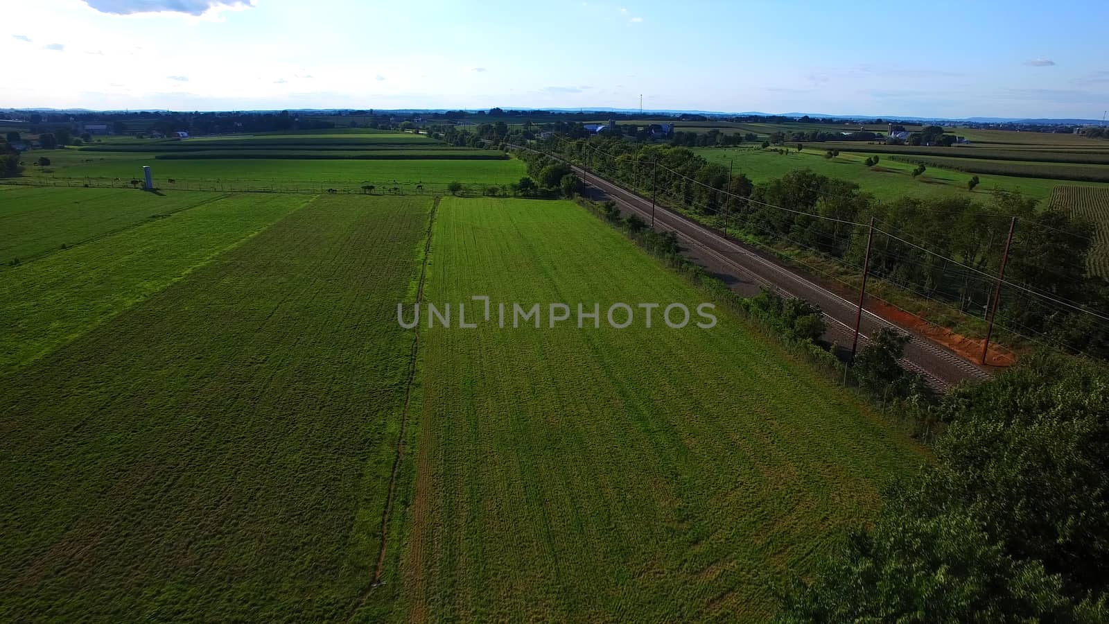 Aerial View of Amish Farm Countryside in Autumn from a Drone