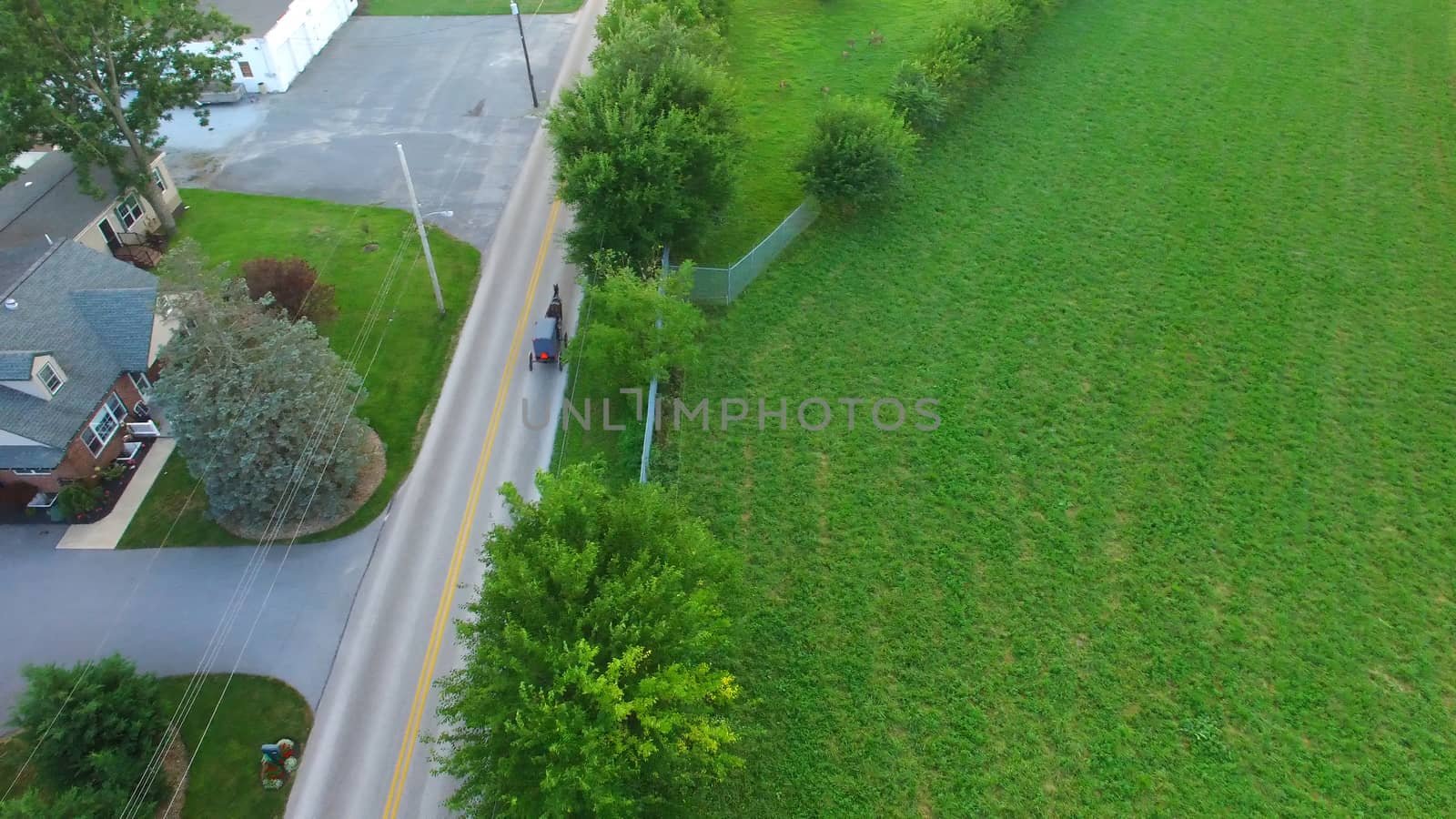 Aerial View of Amish Farm Countryside in Autumn from a Drone