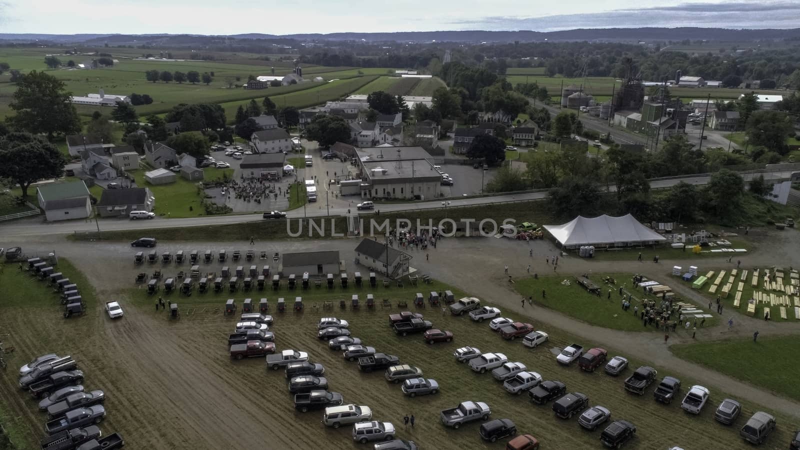 Aerial View of an Amish Fall Mud Sale as seen by a Drone on a Cloudy Day