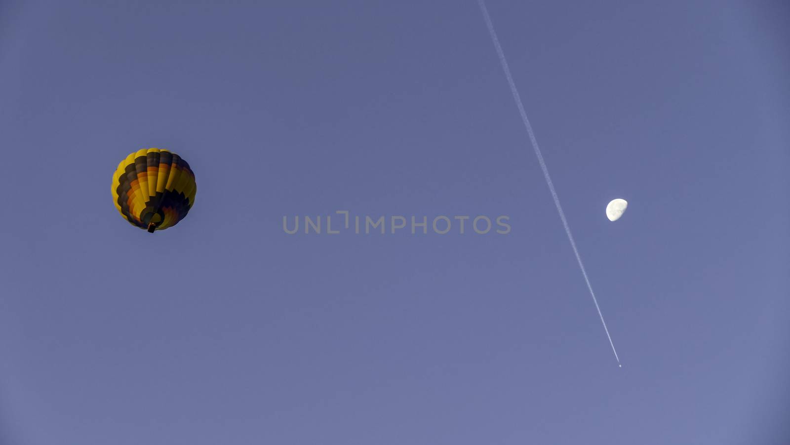 Hot Air Balloon with Moon in Amish Countryside in the Autumn
