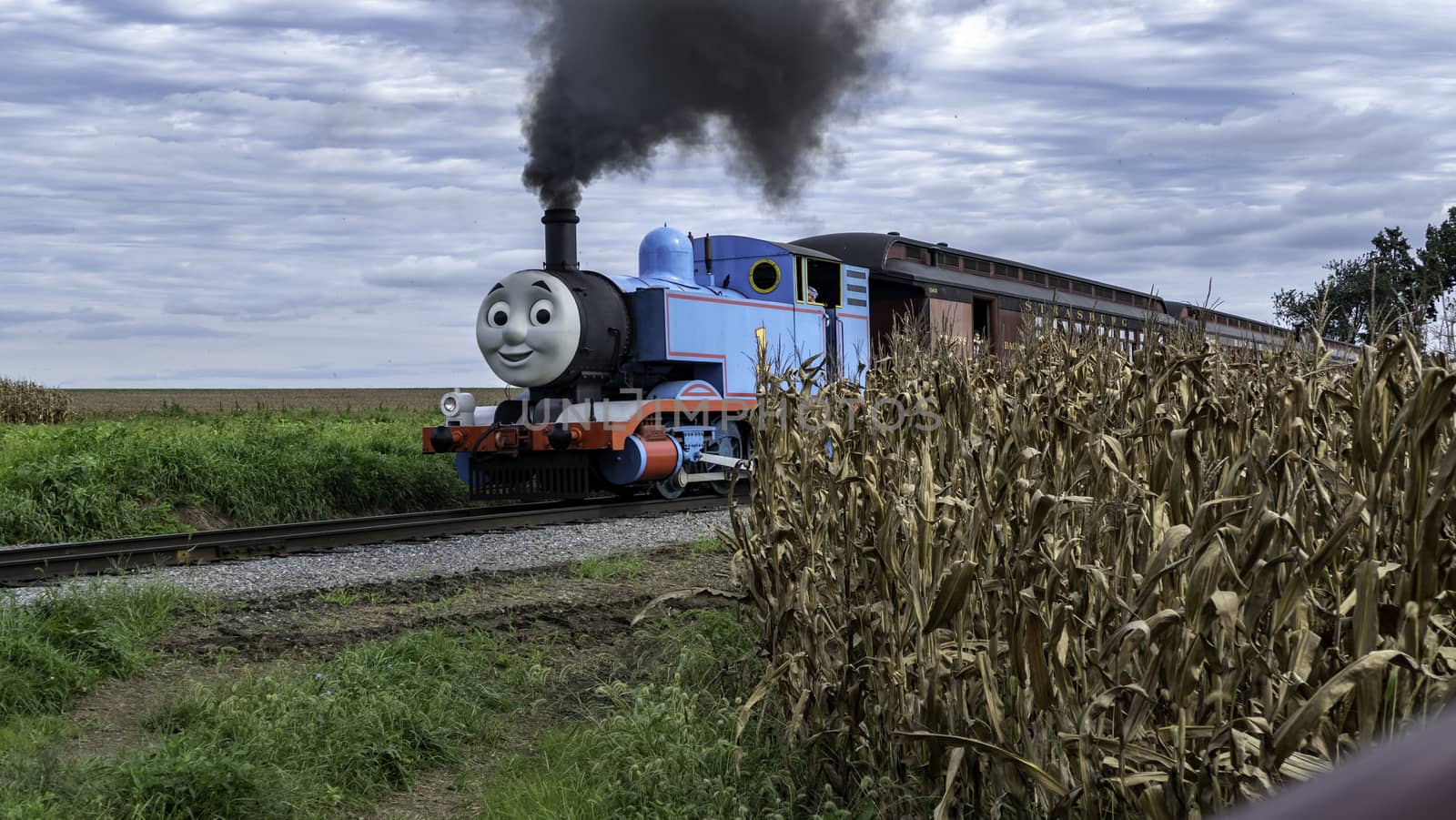Strasburg, Pennsylvania, September 2018 - Thomas the Train Puffing along Amish Countryside on a Sunny Autumn Day