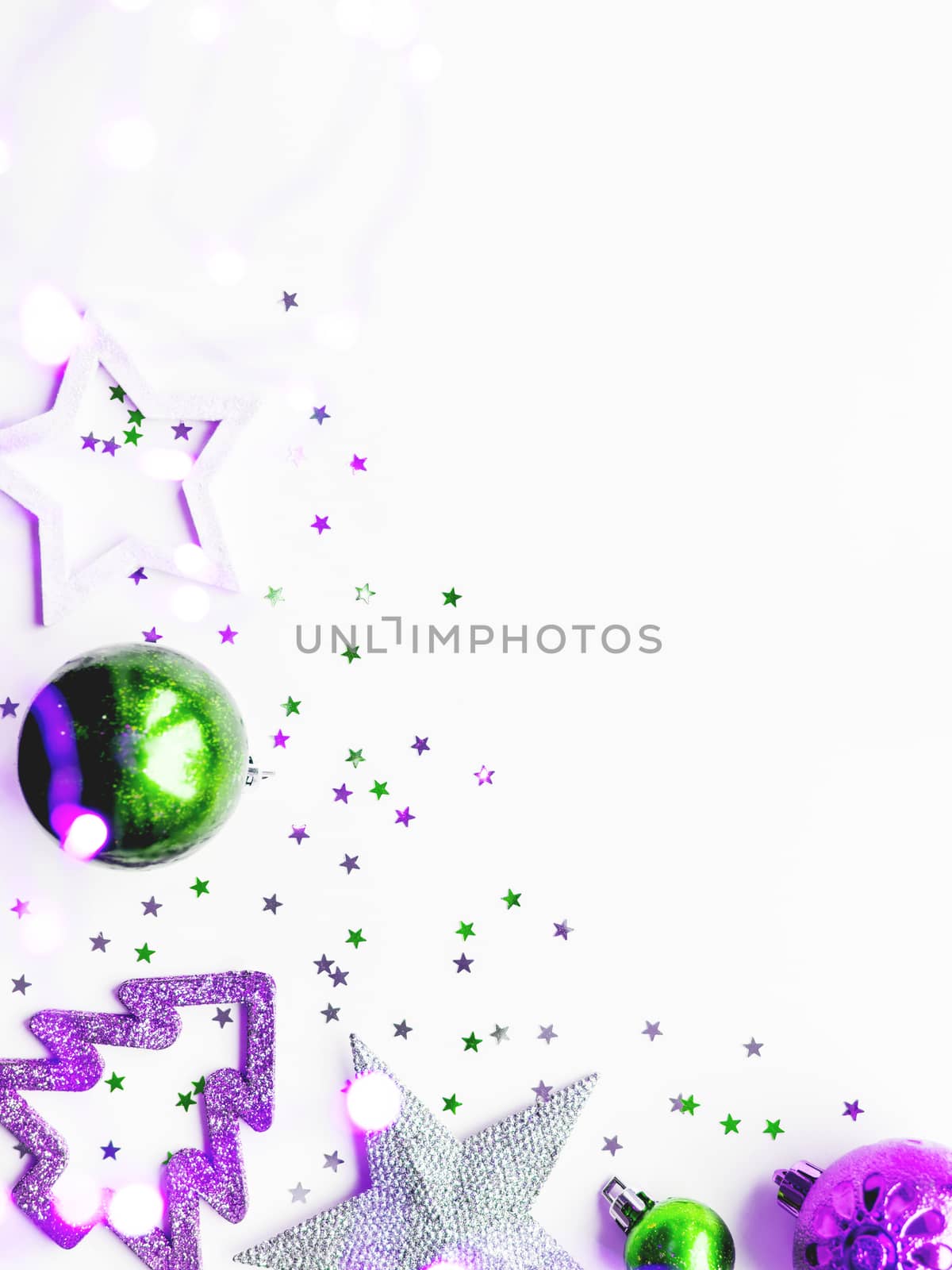 Christmas and New Year background with decorations - green and magenta shiny stars, balls, snowflakes and confetti. by aksenovko