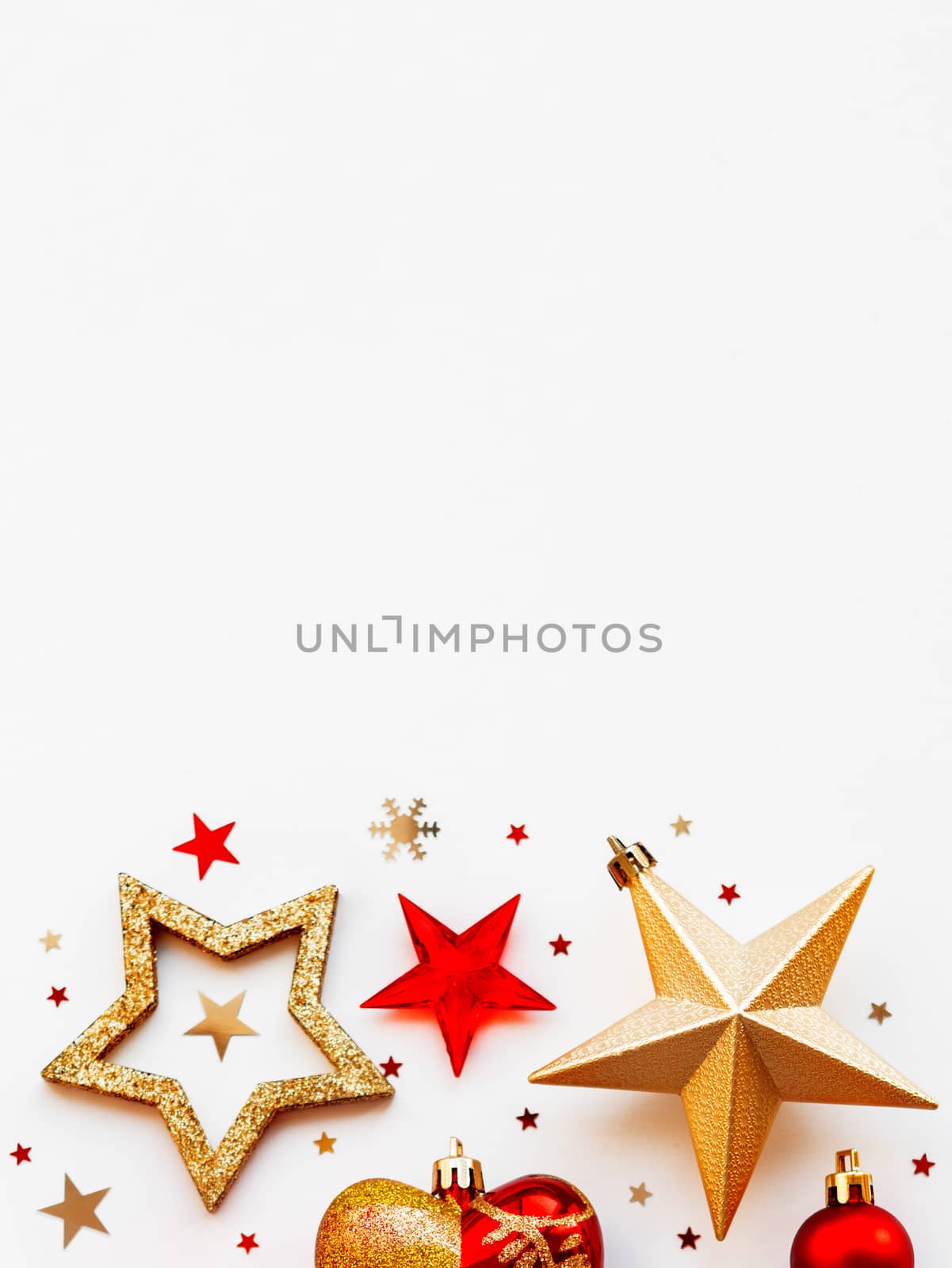 Christmas and New Year 2020 background with decorations, shaped as a circle. Golden and red balls, stars, confetti and heart.