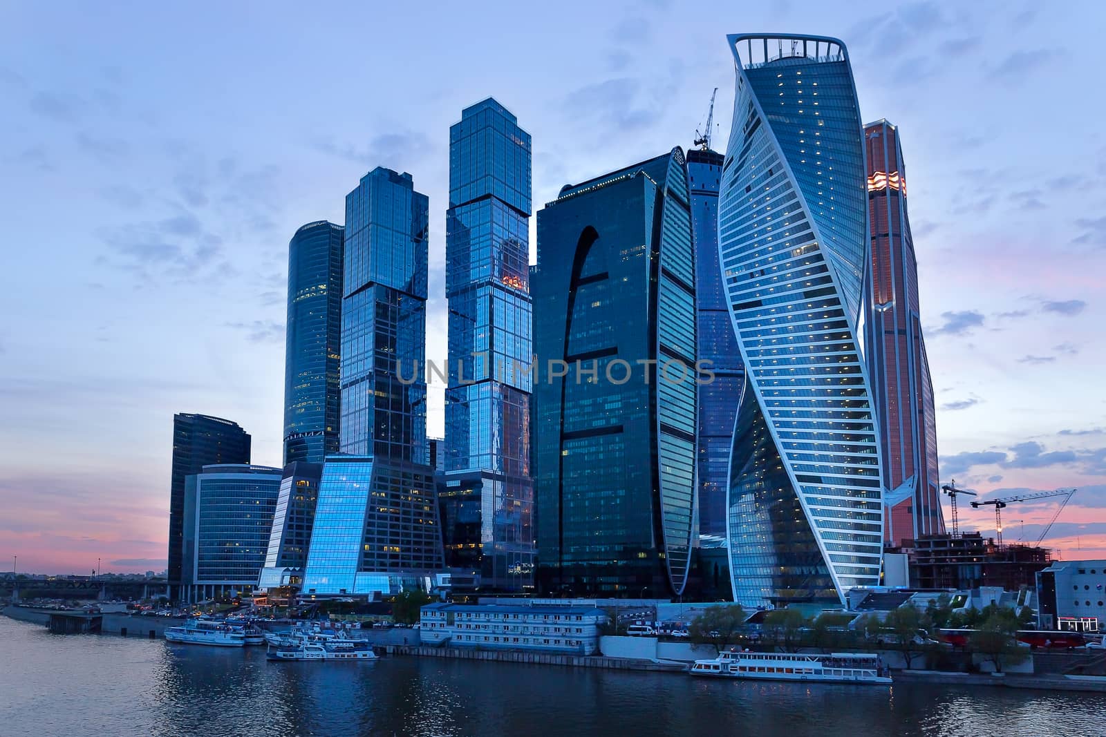 Moscow-city business center, Moscow, Russia. Big office complex near Moscow-river at sunset.