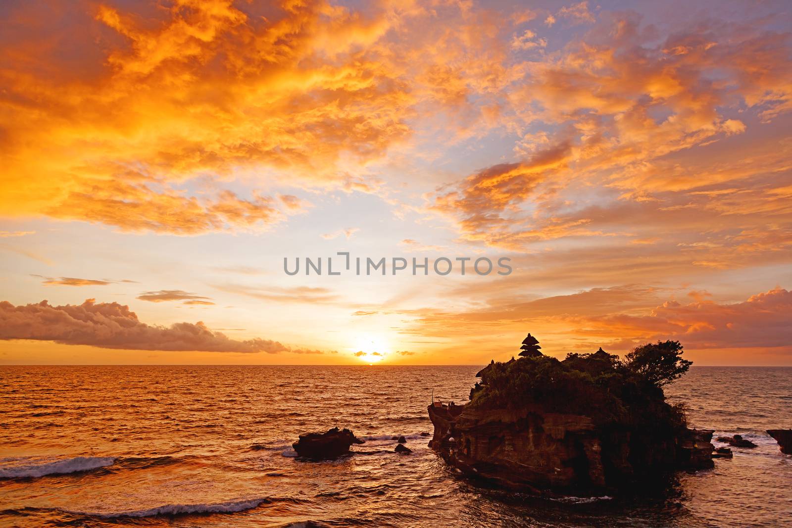 Sunset at Tanah Lot temple. Bali island, Indonesia.